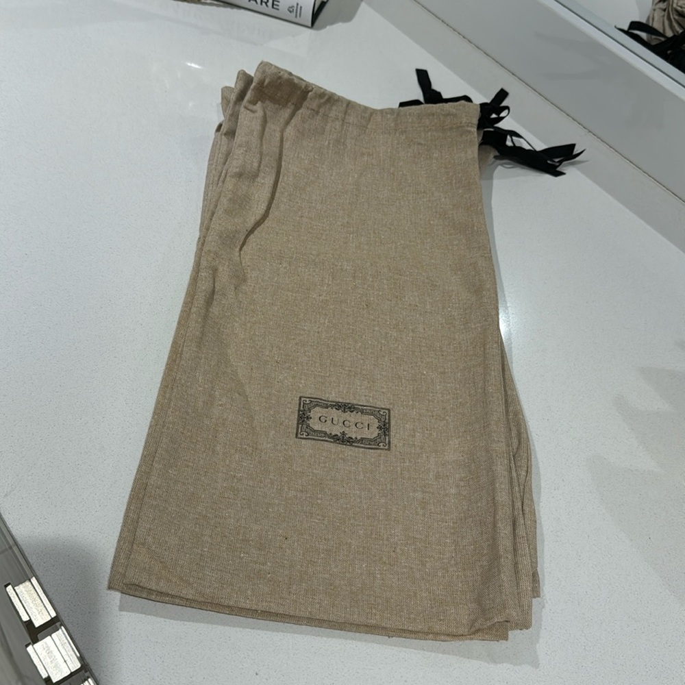 Gucci - Dustbag set of (2) shoes.